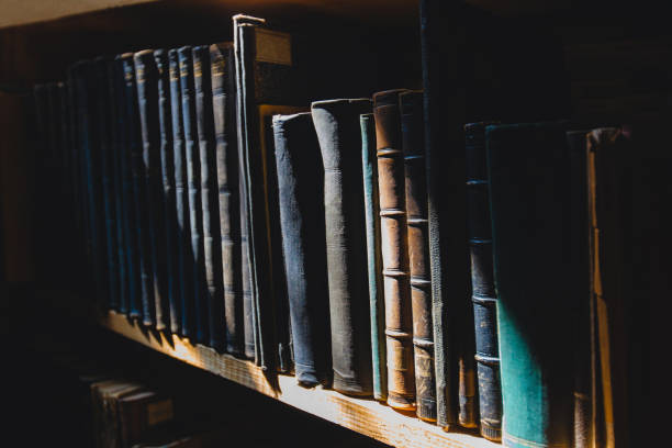 istock old books on the shelf in the library under the sun ray 1455500536