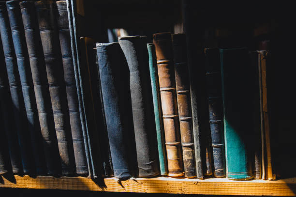 istock old books on the shelf in the library under the sun ray 1455500537