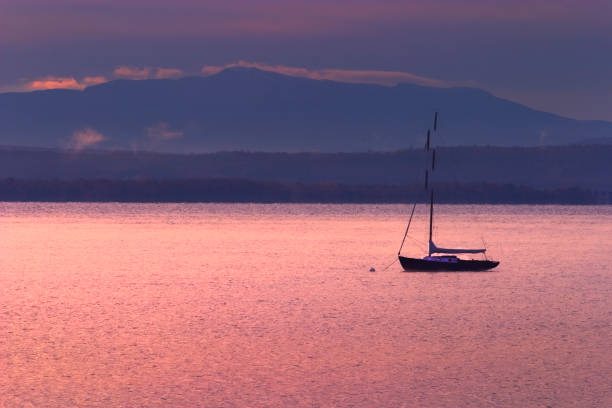 Sailboat on Lake Champlain with Mt. Mansifield in the background from North Hero, Vermont.  From the Lake Champlain Islands.
