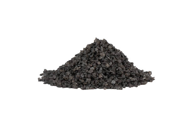 istock A pile of natural black salt on a white background. 1455503582