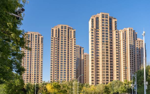 istock Modern residential complex with tall houses against the blue sky 1455503796