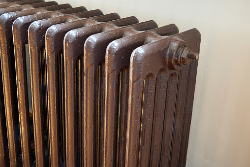 Old-fashioned and vintage metal radiator in close-up