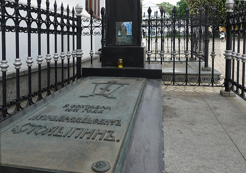 Kyiv. Ukraine. May 16, 2019. The tombstone of the famous Russian statesman Pyotr Stolypin in the Kiev-Pechersk Lavra near the Refectory Church. TEXT TRANSLATION: 1911 Pyotr Stolypin