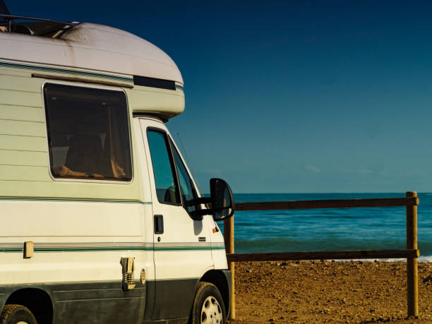 istock Rv motor home camping on beach 1455507731