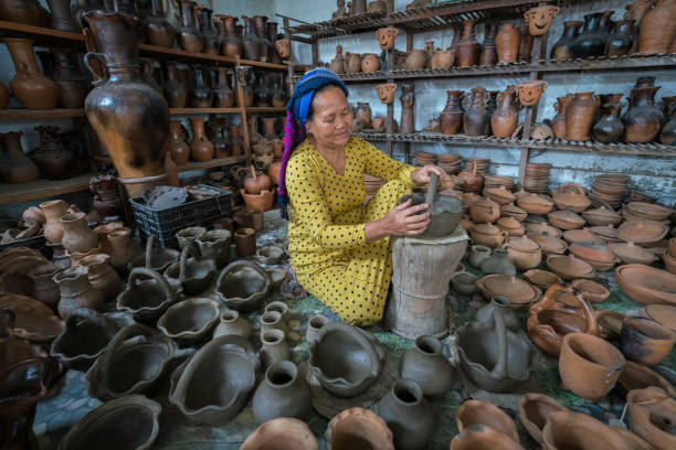 istock Molding clay for making pottery vase 1455513072