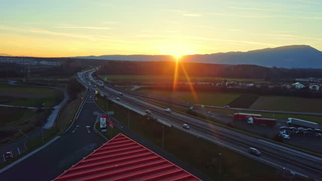 AERIAL View of the highway at sunset