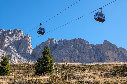 Overhead Cable Car Against Mountains / Dolomites