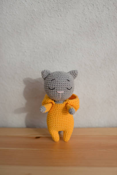 istock Children's toy cute gray cat, handmade. 1455518415