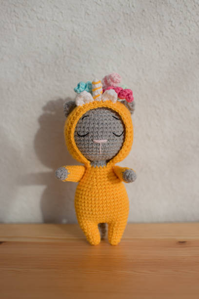 istock Children's toy cute gray cat, handmade. 1455518452