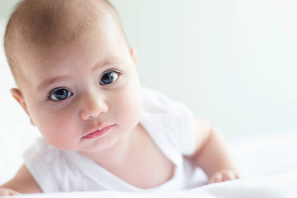 istock Beautiful Baby on White Towel 1455519659