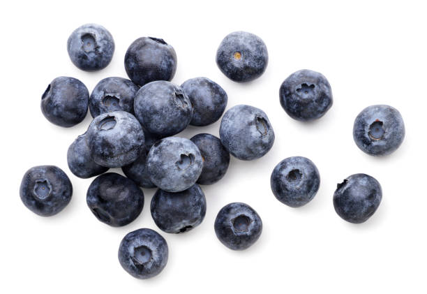 istock Blueberries scattered on a white background. Top view 1455519884