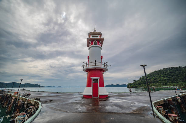 istock Bang Bao Lighthouse with cloudy sky at koh chang trat thailand. 1455520606