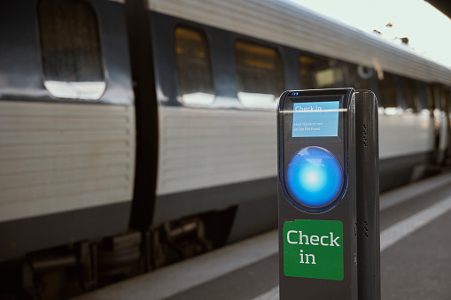 Automatic check in for passengers before entering the train