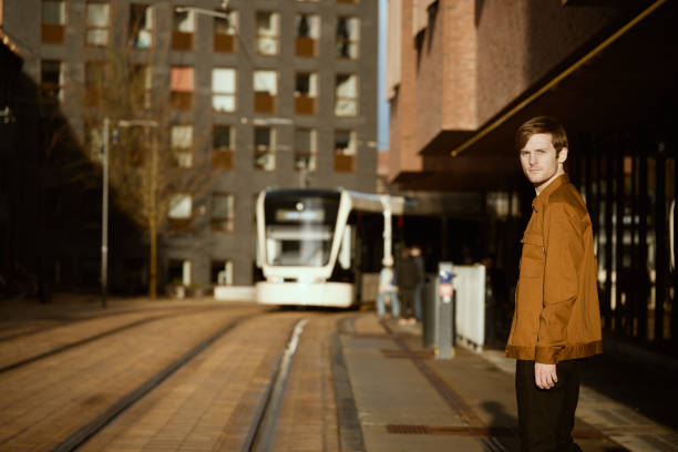 istock Waiting for the lightrail train to arrive 1455529789