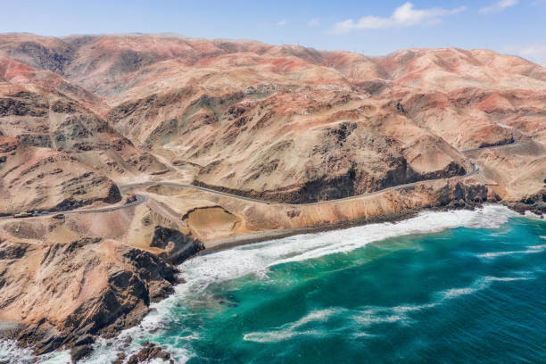 Aerial view of the Panamericana traveling from Ica to Arequipa with the Pacific Ocean on the right and the Peruvian Andes on the left. stock photo