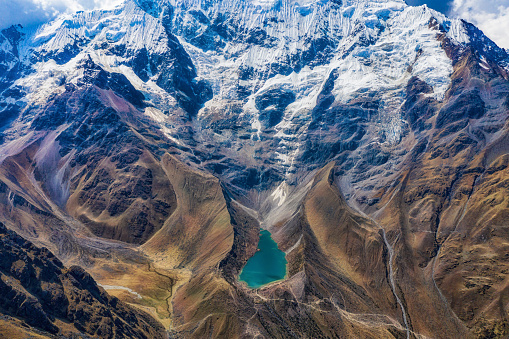 Aerial view from 500 meters of Laguna Humantay and Mount Salcantay in the Peruvian Andes near Cusco. The lagoon itself is at an altitude of 4200 meters. Mount Salcantay is 6271 meters high.