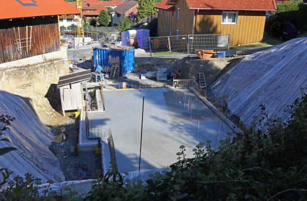 istock A concrete floor slab in a new building is watered to prevent cracking 1455540781