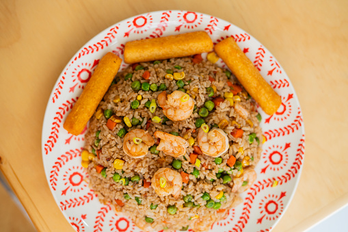 earthenware dish served on the table with shrimp rice