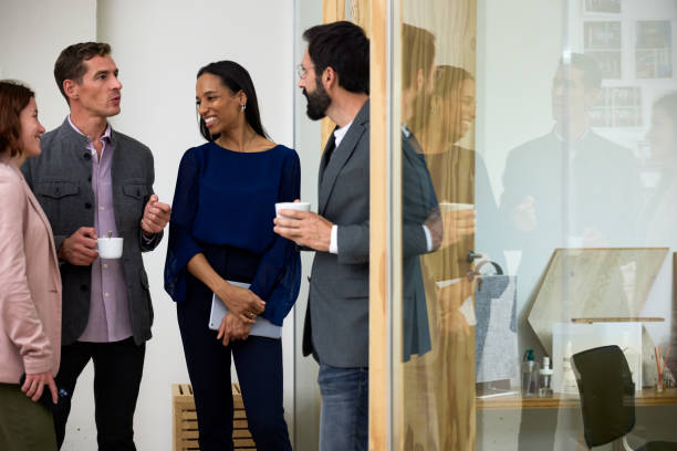 istock Standing in the office for a quick coffee break during a business meeting 1455543933