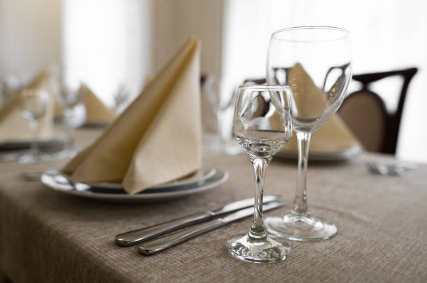 istock empty goblets and other cutlery are served on the festive table. 1455545461
