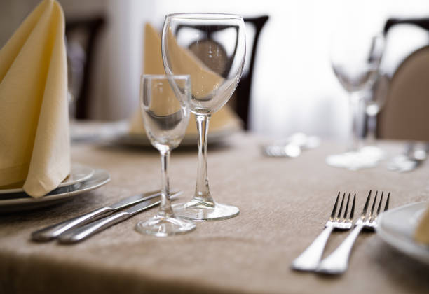 istock empty goblets and other cutlery are served on the festive table. 1455545478