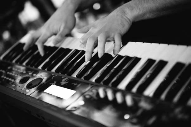 istock a musician plays keyboard instruments at a concert. 1455546594