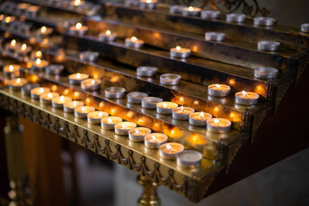 istock many candles in the church 1455546730
