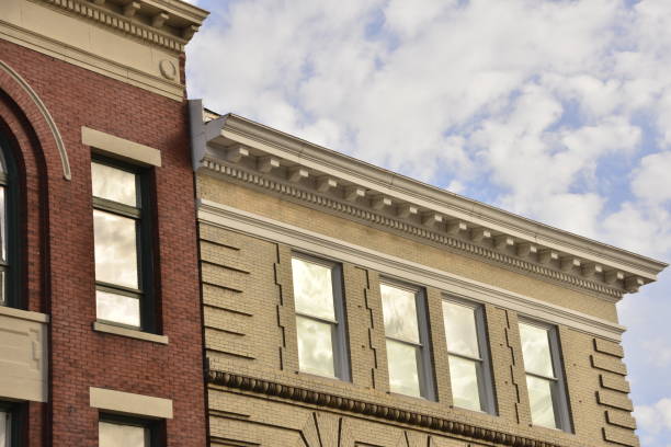 istock Windows On Brick Buildings Reflecting Bright Sun 1455547312