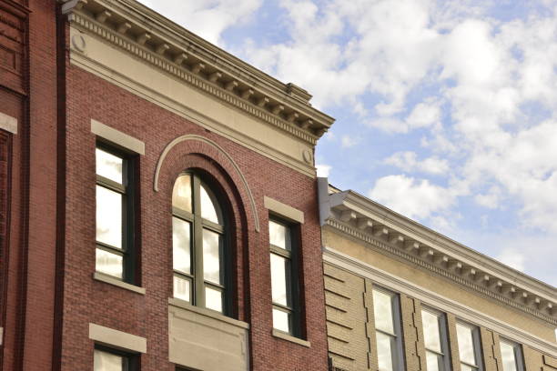 istock Soft Blue Clouds Against Historic Downtown District Buildings 1455547367