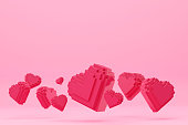 Valentine's Day background with red hearts on pink background