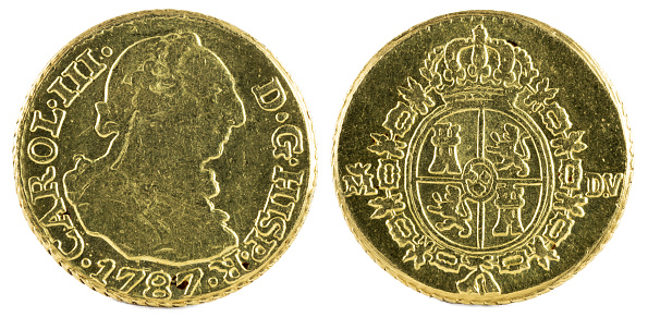 Ancient Spanish gold coin of King Carlos III. With a value of medio escudo and minted in Madrid. 1787.