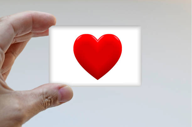 istock Hand holding card decorated with red heart for Valentine's Day 1455552530