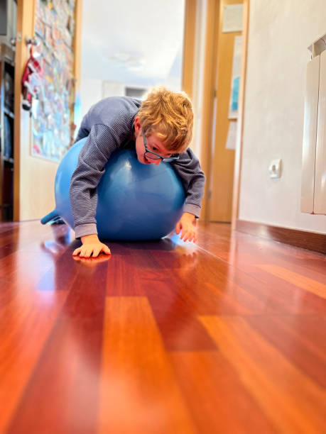 istock Child playing with a giant bouncing ball 1455553536