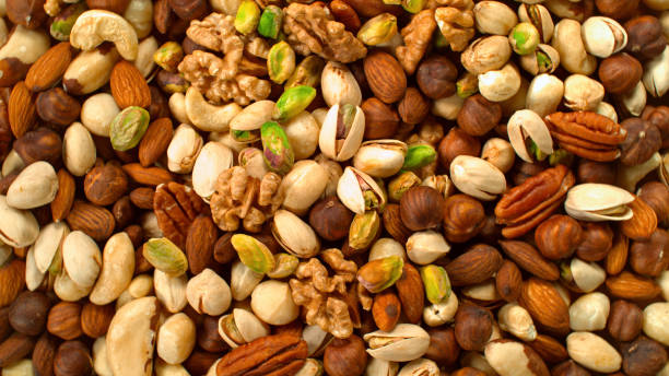 istock Freeze Motion Shot of Flying Various Nuts 1455554589