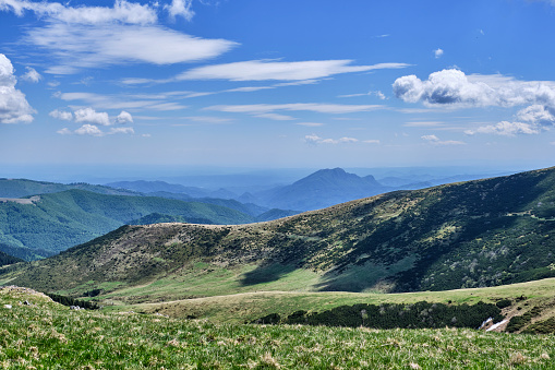 Beautiful shot of the Retezat Mountains on a sunny day in Eastern Europe