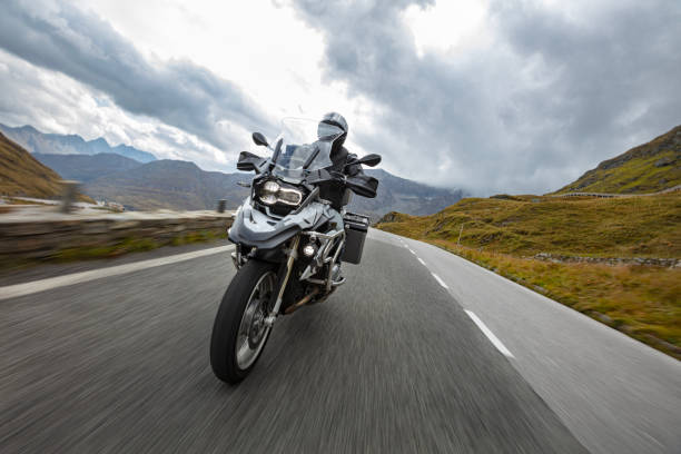 istock Motorbiker riding in Austrian Alps 1455558786