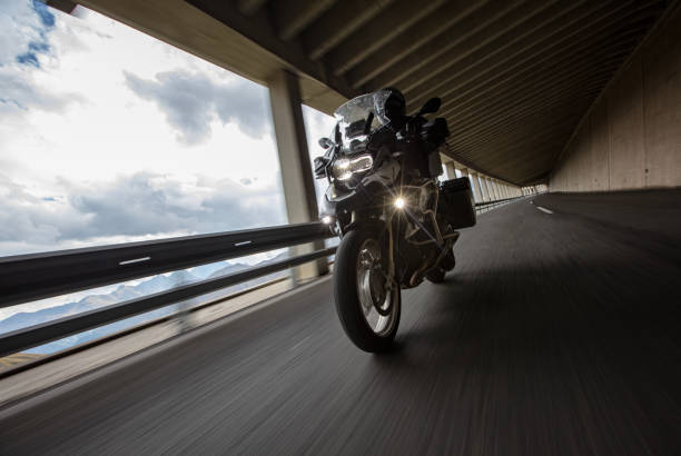 istock Motorbiker riding in Austrian Alps 1455559391