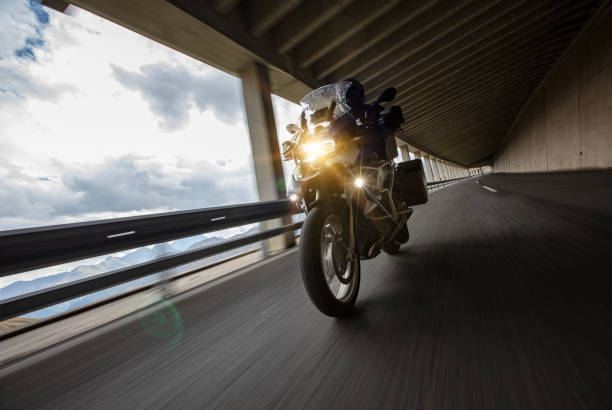 istock Motorbiker riding in Austrian Alps 1455559877