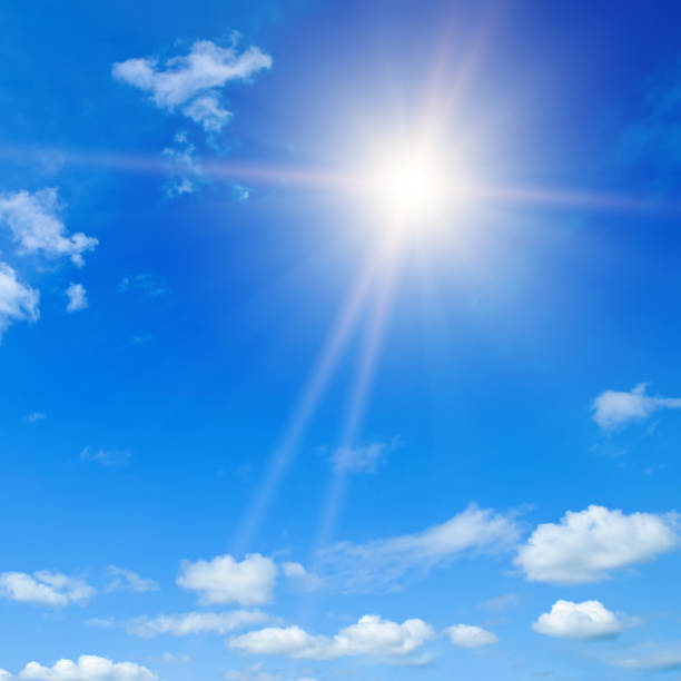 istock Blue sky , sun and beautiful white clouds. 1455561376