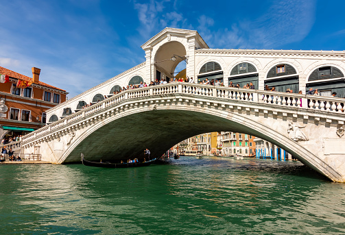 Gondola on Grand canal and Rialto bridge in Venice, Italy