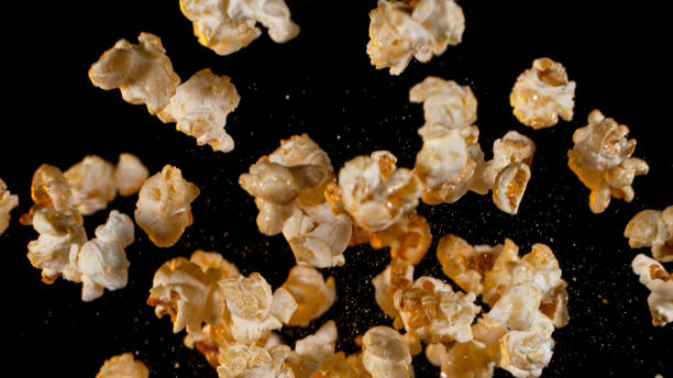 Popcorn Rising 60+ Popcorn Popping Slow Motion Stock Photos, Pictures & Royalty-Free ...