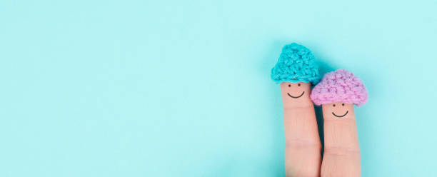 Happy, similing face on finger, couple cuddle together, support, relationship and friendship concept, valentines day