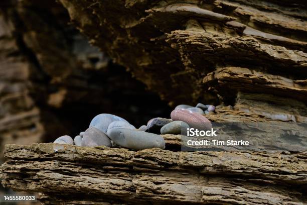 River Pebbles On Eroded Sandstone In The Cliffs Of The Scottish Coast Stock Photo - Download Image Now