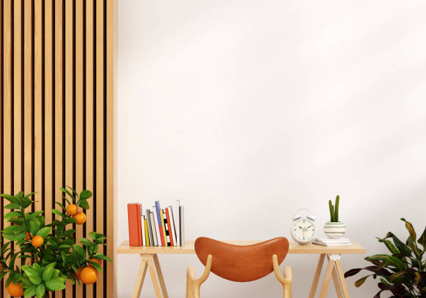 desk and armchair in white living room with copy space, 3d rendering - orange wall imagens e fotografias de stock