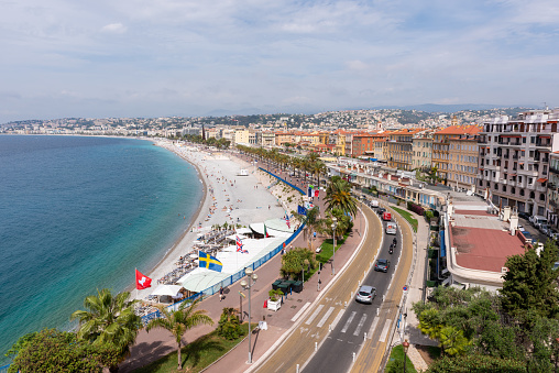 Nice, Alpes-Maritimes, Provence-Alpes-Cote-d’Azur, France – 23 May 2022 : View of « la promenade des anglais » and the old Nice