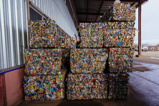 istock Stacks of garbage. Pressed and packed aluminum cans 1455584179