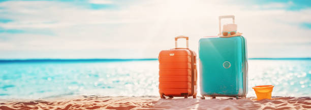 panoramic view of the seacoast with suitcases on the sandbeach. - activity baltic countries beauty in nature blue imagens e fotografias de stock