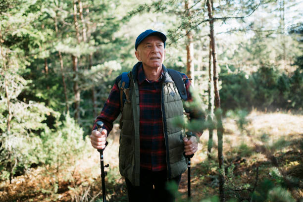 istock Mature man hiking in nature on a weekend 1455584670