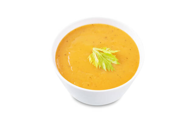 istock Celery carrot puree soup in a bowl on a white isolated background 1455585552