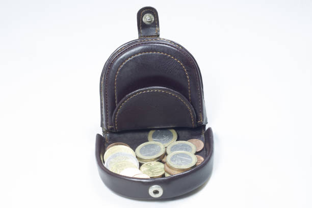 istock coin purse with coins 1455585663